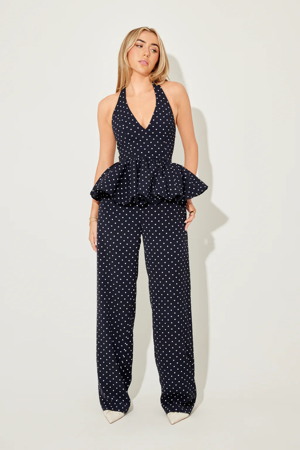 The Ultimate Muse Polka Dot Peplum Top