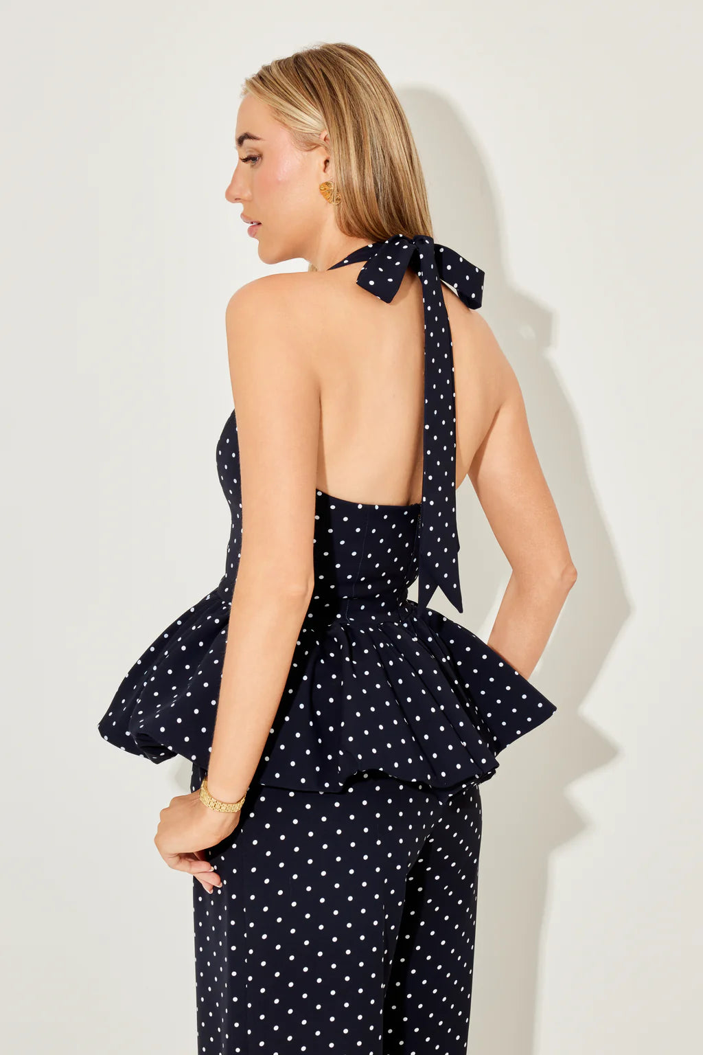 The Ultimate Muse Polka Dot Peplum Top